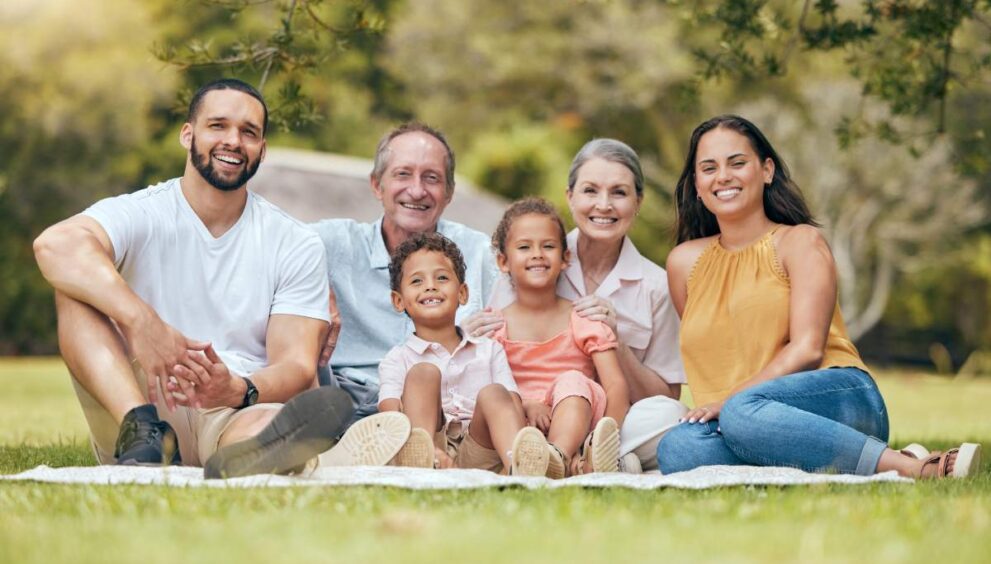 Big family, picnic and outdoor at nature park with children, parents and grandparents together for .