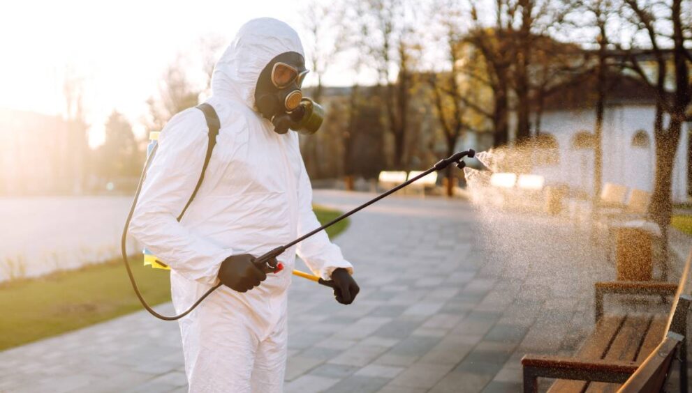 man-wearing-protective-suit-disinfecting-public-pl-2023-11-27-05-14-13-utc(arti)