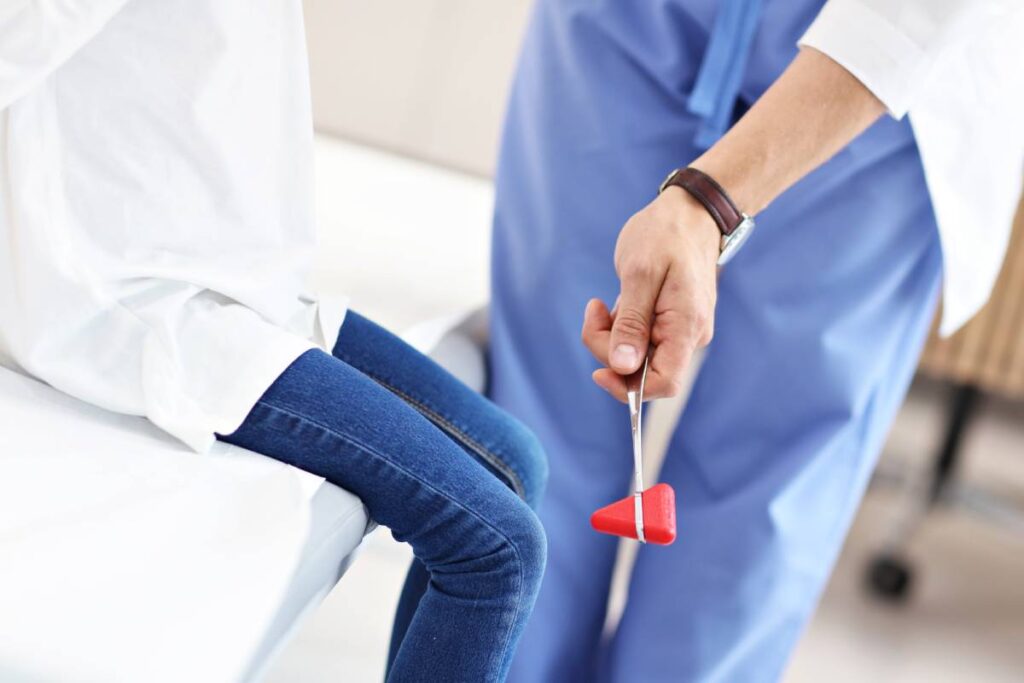 Little girl in clinic having a checkup with neurologist